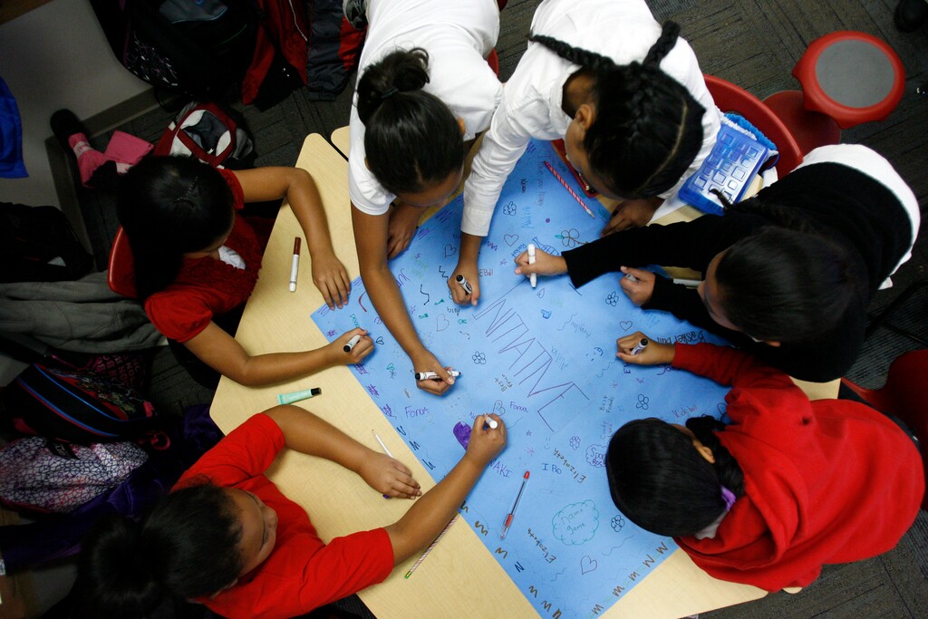Francisco Kjolseth | The Salt Lake Tribune
Working together on poster as part of their "Crew" program that helps students identify with one another and work as a team, fourth graders from the Pacific Heritage Academy charter school in North Salt Lake near the end of the day on Friday, November 9, 2012. Enrollment numbers are out, and the state's public school population has topped 600,000 for the first time, and the state's charter school population has topped 50,000 for the first time. The Pacific Heritage Academy filled their with a student population of 450.
