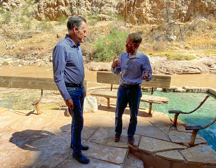 (Mark Eddington | The Salt Lake Tribune) Utah Sen. Mitt Romney, left, visits with Washington County Water Conservancy District general manager Zach Renstrom during a tour of the closed La Verkin Hot Springs resort on Tuesday, Aug. 16, 2022. During his visit to southwest Utah, Romney discussed the importance of water conservation and how it will impact development in the region.