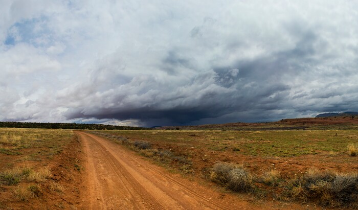 (photo courtesy Manny Mellor) Clouds are seen above Lake Powell near Hole in the Rock.