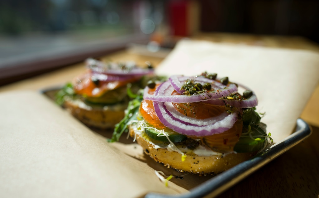 (Bethany Baker  |  The Salt Lake Tribune) A smoked salmon bagel sits on a tray inside at Fairway Bagels and Donuts in Logan on Thursday, March 26, 2026.