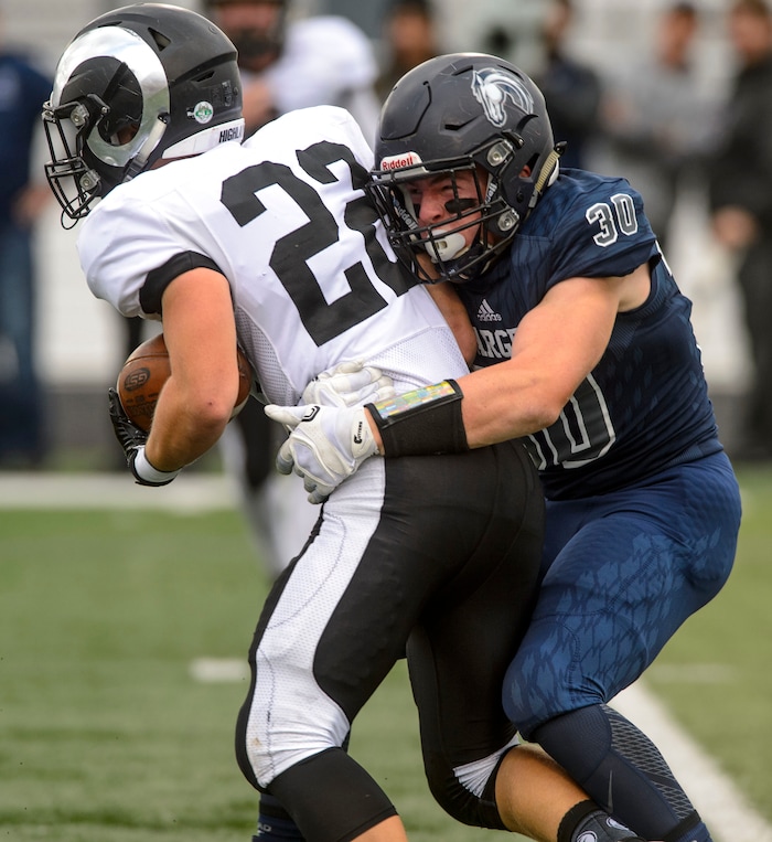 (Steve Griffin  |  The Salt Lake Tribune)  Class 5A state quarterfinal football game between Highland and Corner Canyon in Draper Friday November 3, 2017.