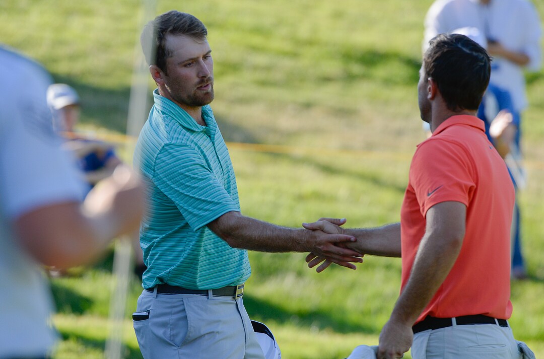 (Francisco Kjolseth  |  The Salt Lake Tribune)  Steven Ihm, left, of Peosta, IA, shakes hands with Luke Guthrie of Quincy, IL, after their finish in the Utah Championship golf event on the Web.com Tour at Oakridge Country Club in Farmington on Sunday, July 15, 2018. Ihm took second place, one stroke behind Cameron Champ. 