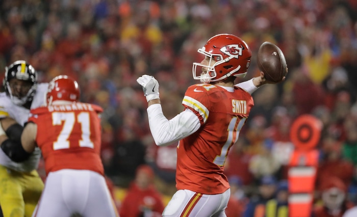 Kansas City Chiefs quarterback Alex Smith (11) throws against the Pittsburgh Steelers during the first half of an NFL divisional playoff football game Sunday, Jan. 15, 2017, in Kansas City, Mo. (AP Photo/Charlie Riedel)