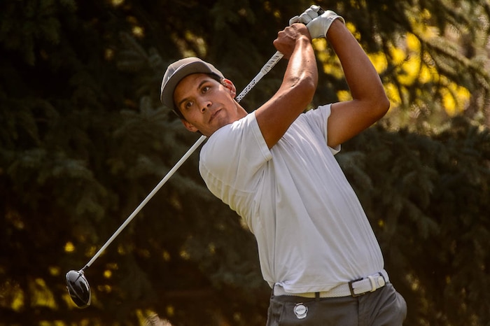 (Trent Nelson | The Salt Lake Tribune)  
Garrett Fotu drives at the Utah Open golf tournament at Provo's Riverside Country Club, Sunday Aug. 19, 2018.