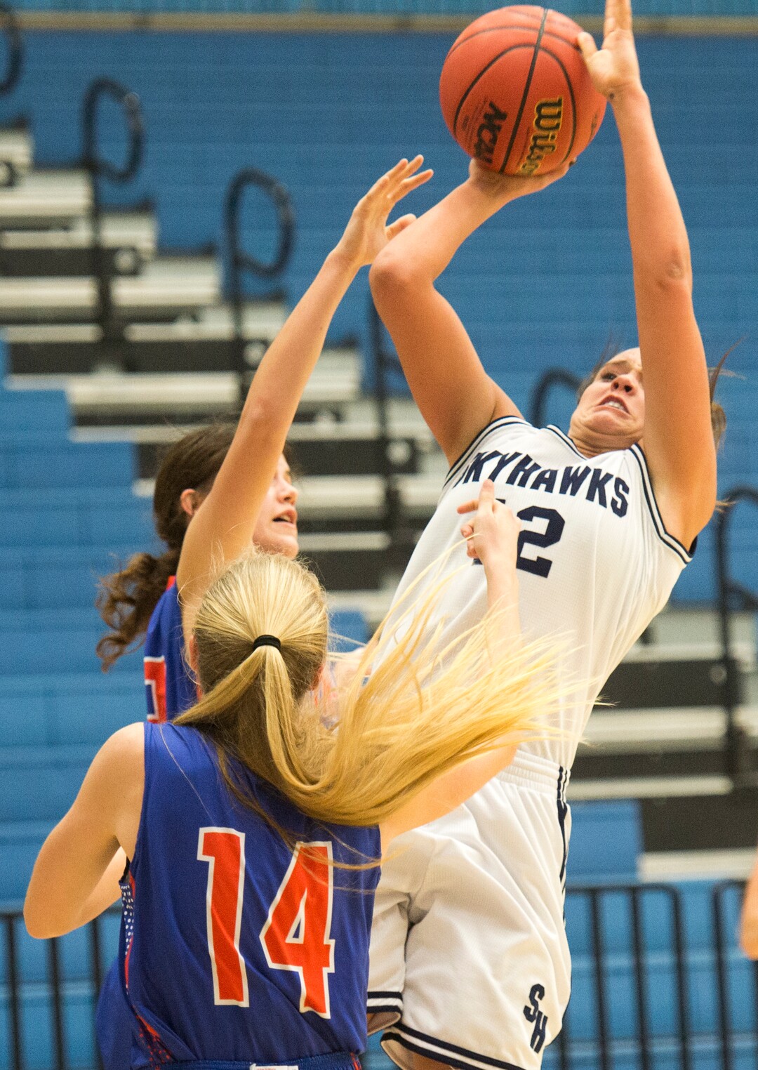 Rick Egan  |  The Salt Lake TribuneSalem Hills forward Lauren Gustin (12) takes a shot for the Skyhawks, in State Basketball Playoff action, The Salem Hills Skyhawks vs. The Timpview Thunderbirds, in Taylorsville, February 22, 2016.