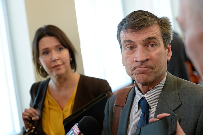 (Francisco Kjolseth  |  The Salt Lake Tribune)  Defense attorney's Greg and Rebecca Skordas discuss their clients case, former Brighton High and University of Southern California linebacker Osa Masina who had just been sentenced for sexual battery at the Matheson Courthouse in Salt Lake City on Tuesday, Dec. 5, 2017. Masina was sentenced to 365 days in jail, followed by two years on probation and won't be required to register as a sex offender.