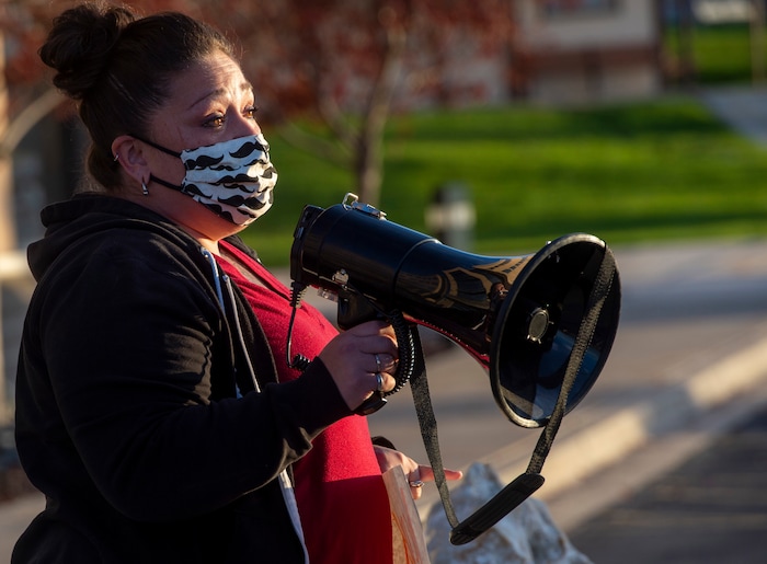 (Rick Egan  |  The Salt Lake Tribune)  Kate Kalt speaks at a rally for prison inmates, after a COVID-19 outbreak has spread at the Draper prison, at the Department of Corrections, on Tuesday, Oct. 13, 2020.