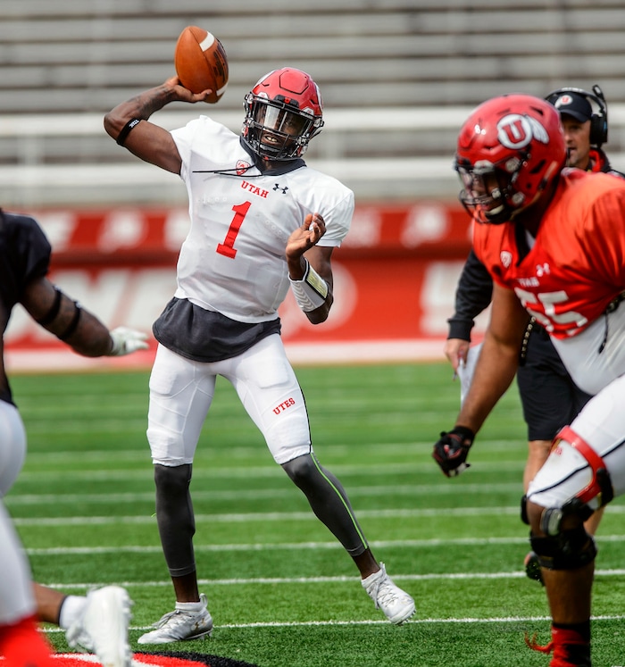 (Steve Griffin  |  The Salt Lake Tribune) Utah quarterback Tyler Huntley throws a pass during the University of Utah football team's first scrimmage at Rice-Eccles Stadium in Salt Lake City Friday March 30, 2018.