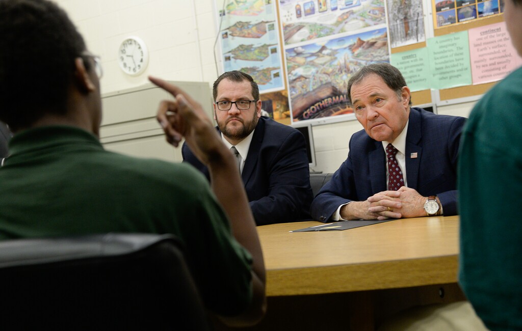 (Francisco Kjolseth  |  Tribune file photo) Juvenile Justice Services Director Brett Peterson, at Decker Youth Center in West Valley City, center left, is joined by Gov. Gary Herbert as they speak with some of the youth working through the program on Wednesday, Jan. 15, 2020, during a tour to discuss its success after juvenile justice reforms were passed in 2017.