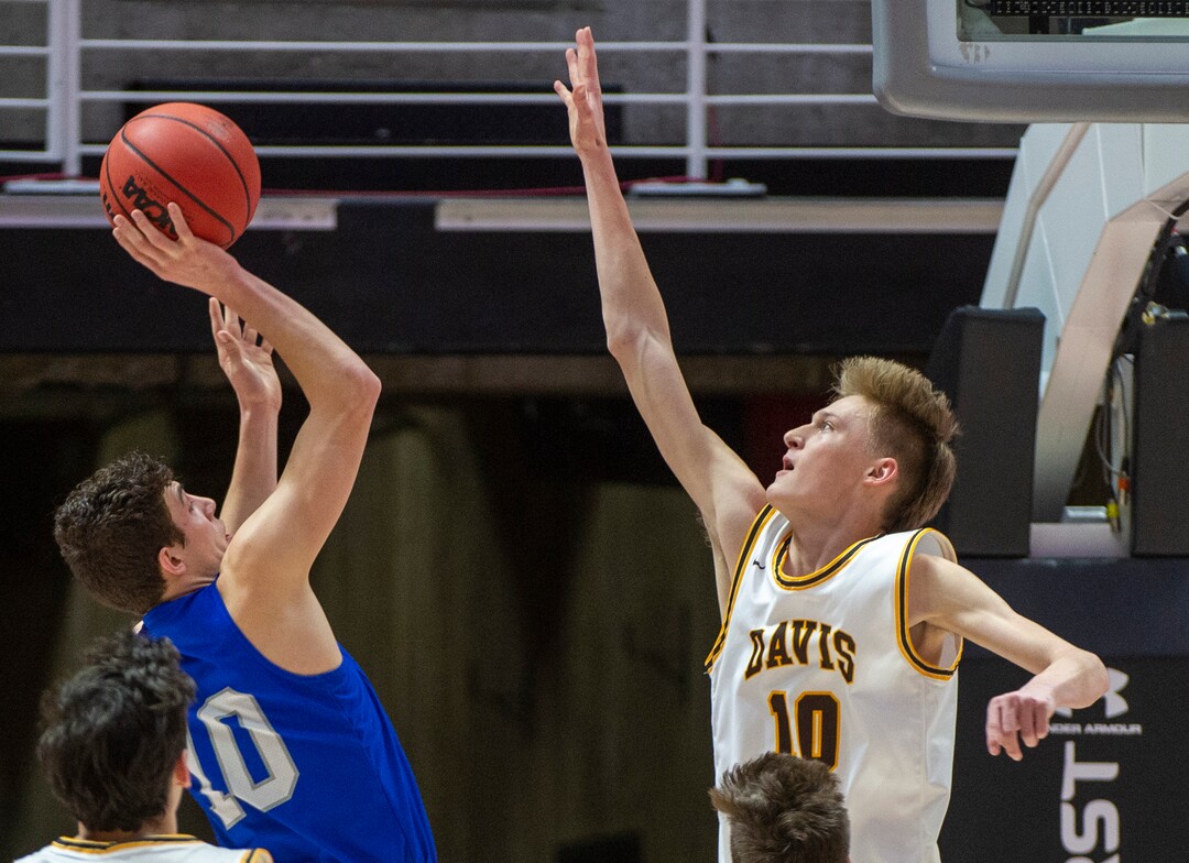 (Rick Egan  |  The Salt Lake Tribune)   Fremont Silverwolve's Baylor Harrop (10)shoots over Davis High guard Trevan Leonhardt (10), in the 6A basketball championship game at the Jon M. Huntsman Center, Saturday Feb. 29, 2020