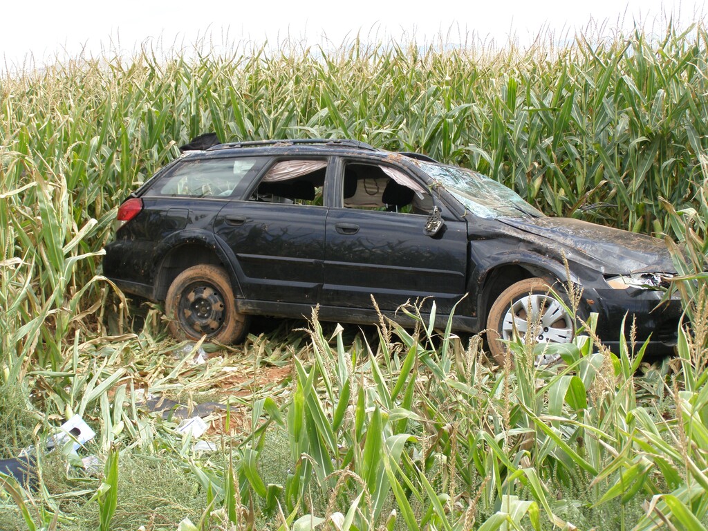 An 82-year-old woman was in "very critical" condition following this rollover crash in Sevier County on Sunday. (Photo courtesy UHP)