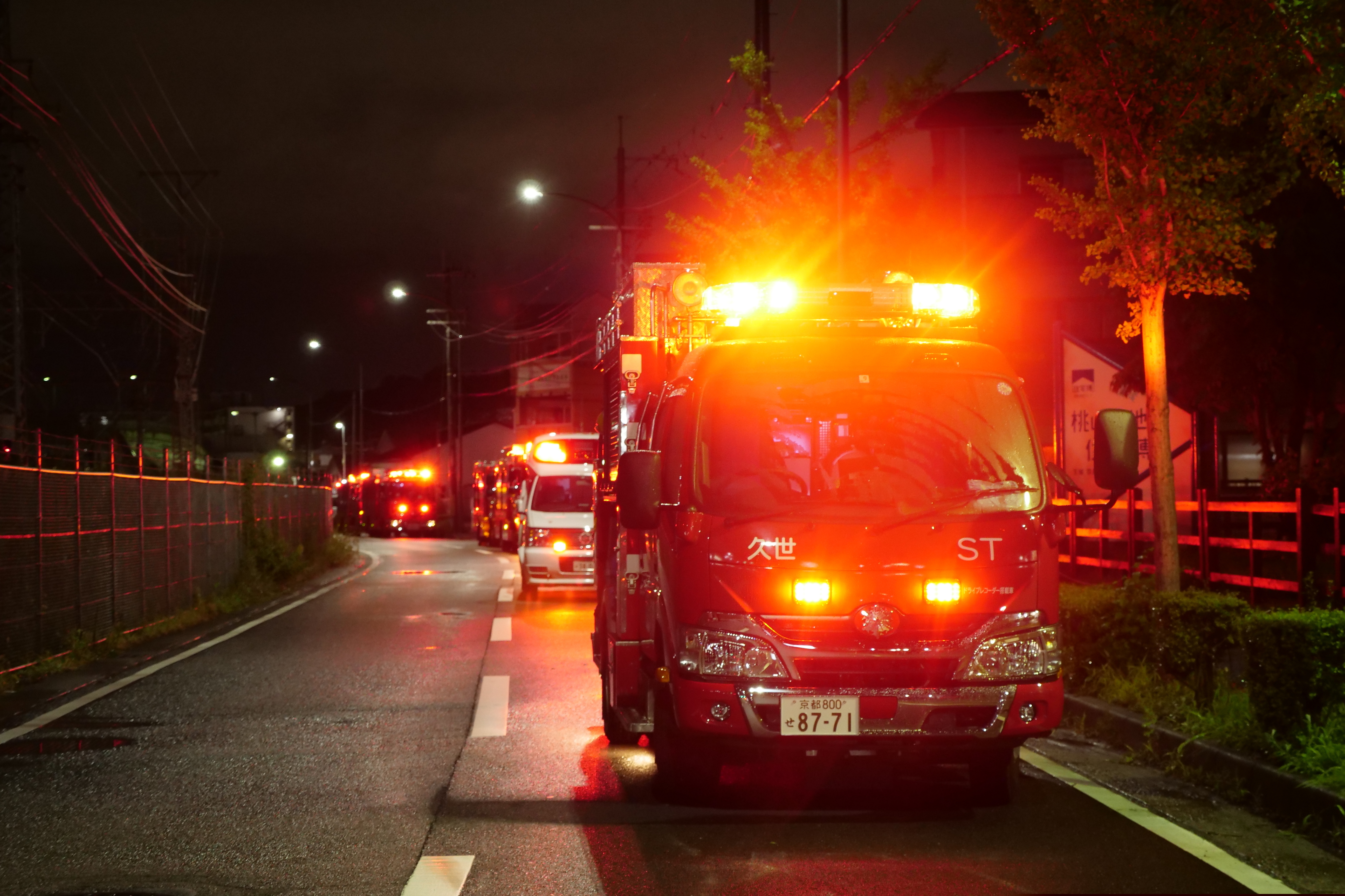 (Hiromi Tanoue | AP Photo) A fire engine stands by near the building of Kyoto Animation following a fire in Kyoto, western Japan, Thursday, July 18, 2019. The fire broke out in the three-story building in Japan's ancient capital of Kyoto, after a suspect sprayed an unidentified liquid to accelerate the blaze, Kyoto prefectural police and fire department officials said.