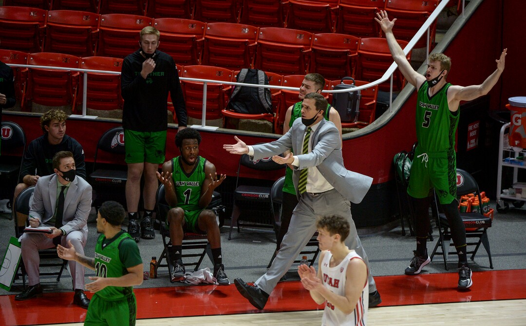 (Leah Hogsten  |  The Salt Lake Tribune) Utah Valley Wolverines head coach Mark Madsen and the team questions a call as the Utes host Utah Valley University on Tuesday, Dec. 15, 2020 at the Jon M. Huntsman Center. The Utes won 75-67.