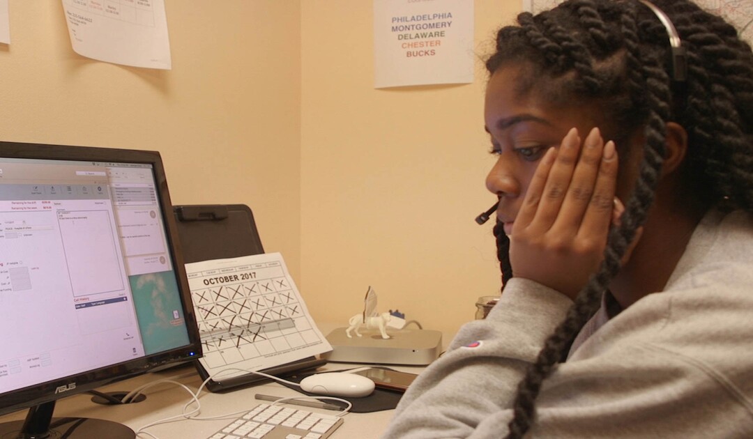 (Image courtesy of Janet Goldwater | Sundance Institute) An operator staffs a phone line in a scene from "Abortion Helpline, This is Lisa," directed by Barbara Attie, Janet Goldwater and Mike Attie, an official selection of the Shorts Programs at the 2020 Sundance Film Festival.