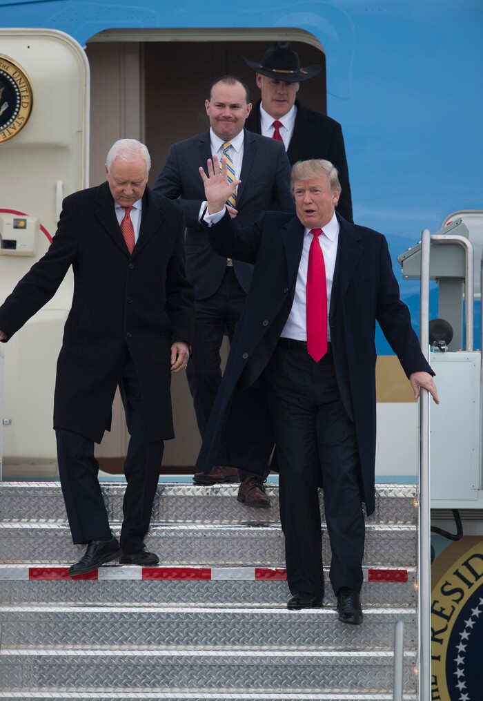 (Scott Sommerdorf   |  The Salt Lake Tribune)   President Trump arrives with Senators Hatch and Lee, and Interior Sec. Zinke, after arrival of Air Force One at the Ronald R Wright National Air Guard Base, Monday, December 4, 2017.  