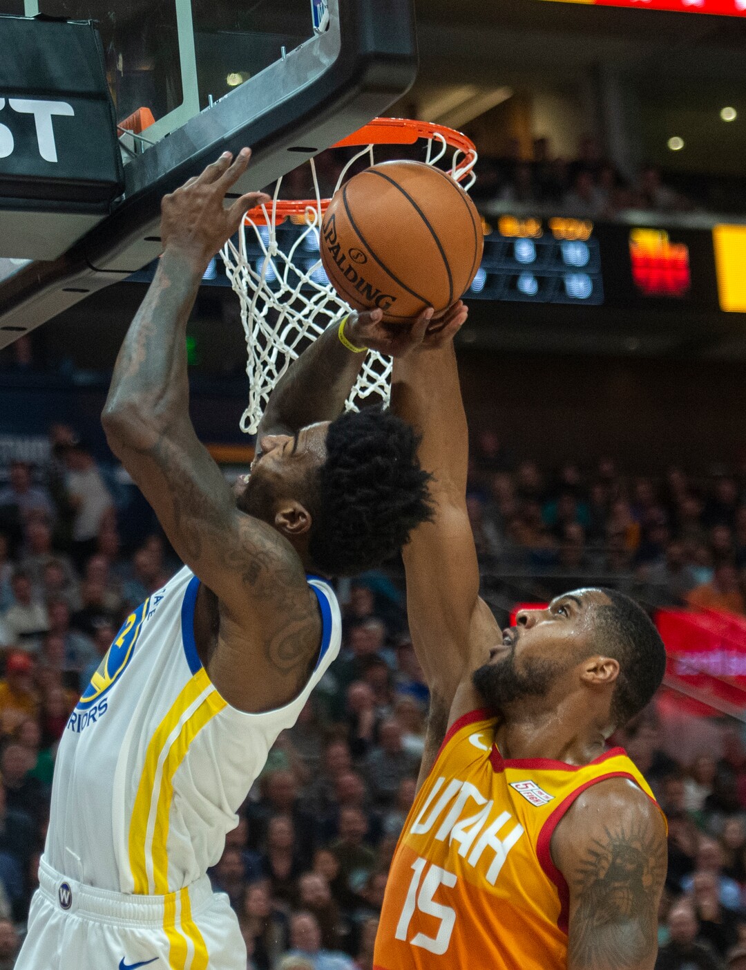 (Rick Egan  |  The Salt Lake Tribune)    Utah Jazz forward Derrick Favors (15) blocks a shot by Golden State Warriors forward Jordan Bell (2), in NBA action between Utah Jazz and Golden State Warriors, in Salt Lake City, Wednesday, Dec. 19, 2018.