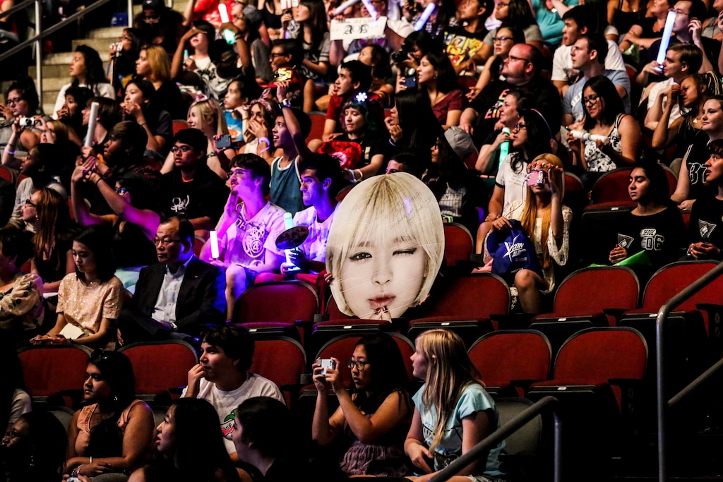 (Krista Schlueter | The New York Times) A cut-out in the crowd at KCON, a Korean pop music festival, at the Prudential Center in Newark, N.J., Aug. 8, 2015. After claiming some credit for the fizzling of President Trump’s rally in Oklahoma, the online armies of Korean pop music listeners are feeling prepared and empowered.