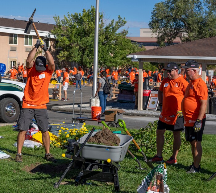 (Rick Egan | The Salt Lake Tribune) More than 600 volunteers, led by Home Depot employees, help spruce up the Sunrise Metro and Freedom Landing apartments in Salt Lake City on Wednesday, Sept. 21, 2022.