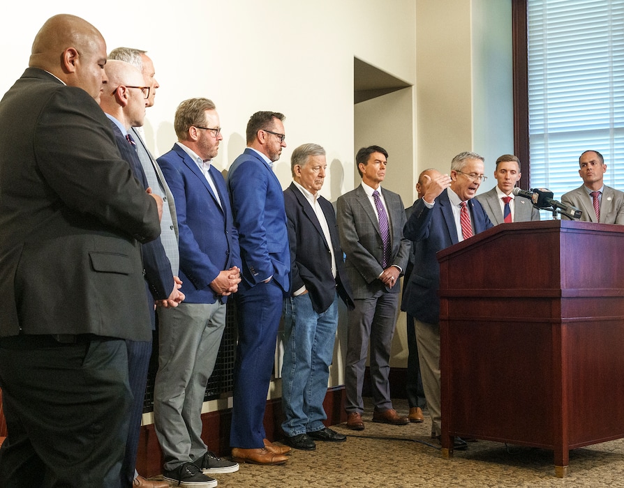 (Leah Hogsten | The Salt Lake Tribune) Jeff Gray, at podium, a candidate for Utah County Attorney joined Utah County leaders and legislators during a press conference at the Captiol Tuesday, June 14, 2022, to discuss the need to replace the current Utah County incumbent Attorney David Leavitt.