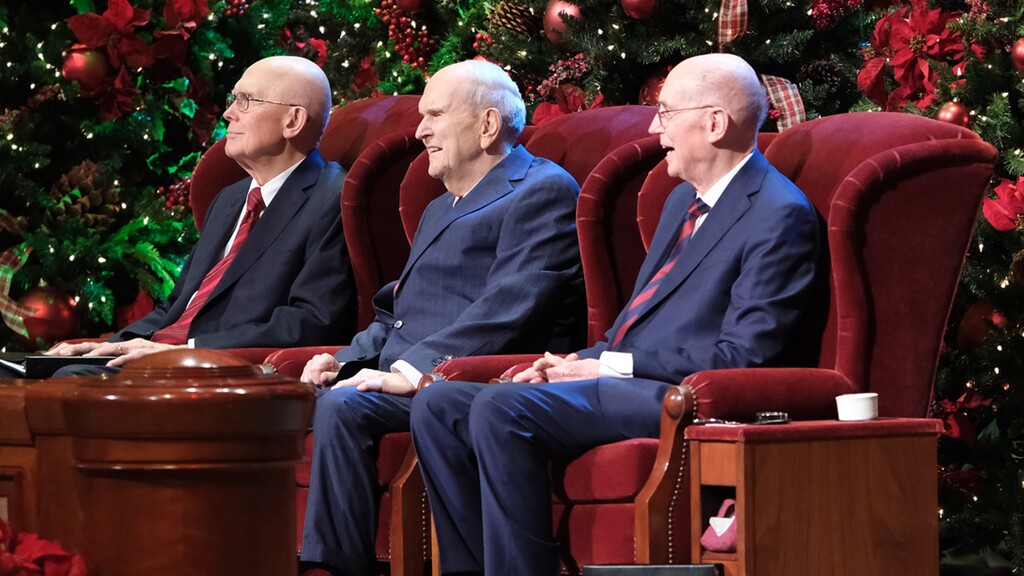 (The Church of Jesus Christ of Latter-day Saints) Members of the First Presidency — President Russell M. Nelson, center, with President Dallin H. Oaks, first counselor, left, and President Henry B. Eyring, second counselor — smile at the beginning of the First Presidency's Christmas Devotional in the Conference Center in Salt Lake City on Sunday, Dec. 3, 2023. All the men are in their 90s.