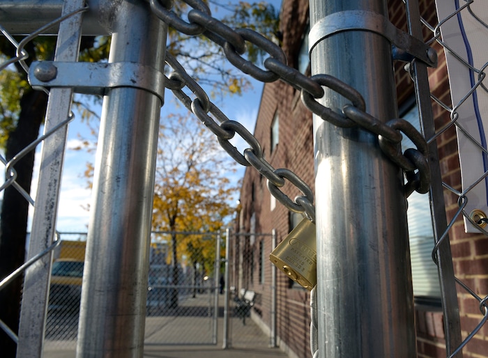 (Al Hartmann | The Salt Lake Tribune)
View of chain link fence that creates a "safe zone" on the north side of the Road Home shelter at 200 South and Rio Grand Streets. This side of the block is locked. Starting Friday Oct. 27 officials require a homeless services ID card to access a newly created “safe space” outside the shelter accessible to people from the south on Rio Grand Street. Homeless have to have their coordinated services card scanned at a booth before passing into the "safe space" whcih includes an open sided tent.
