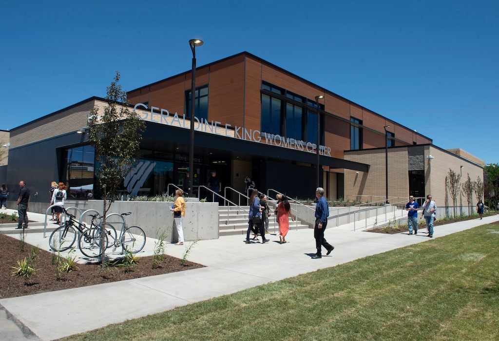 (Rick Egan  |  Tribune file photo)   People gather for the ribbon cutting ceremony for the Geraldine E. King Women's Resource Center, one of three new shelters that will replace the downtown emergency shelter, June 21, 2019.