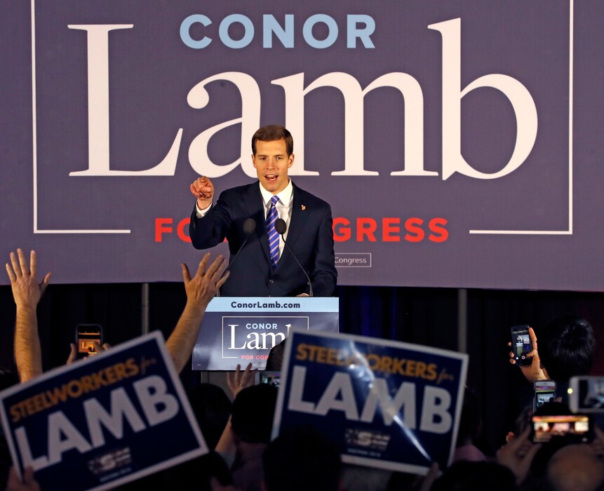Conor Lamb, the Democratic candidate for the March 13 special election in Pennsylvania's 18th Congressional District, celebrates with his supporters at his election night party in Canonsburg, Pa., early Wednesday, March 14, 2018. A razor's edge separated Lamb and Republican Rick Saccone early Wednesday in their closely watched special election, where a surprisingly strong bid by first-time candidate Lamb severely tested Donald Trump's sway in a GOP stronghold. (AP Photo/Gene J. Puskar)