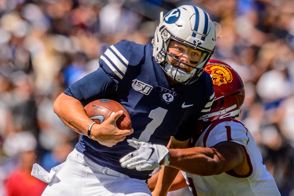 (Trent Nelson  |  The Salt Lake Tribune)  Brigham Young Cougars quarterback Zach Wilson (1) runs the ball as BYU hosts USC, NCAA football in Provo on Saturday Sept. 14, 2019.