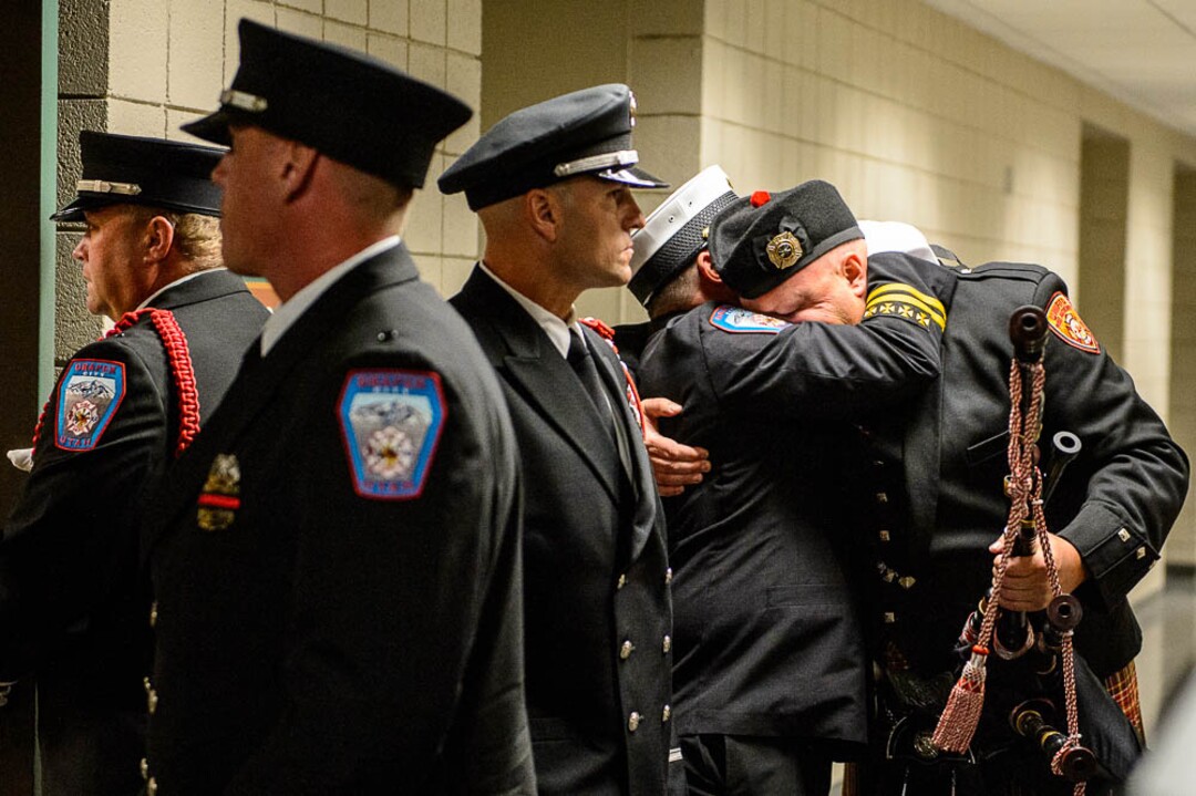 (Trent Nelson | The Salt Lake Tribune)  Honor Guard at the funeral services for Battalion Chief Matthew Burchett at the Maverik Center in West Valley City, Monday Aug. 20, 2018.
