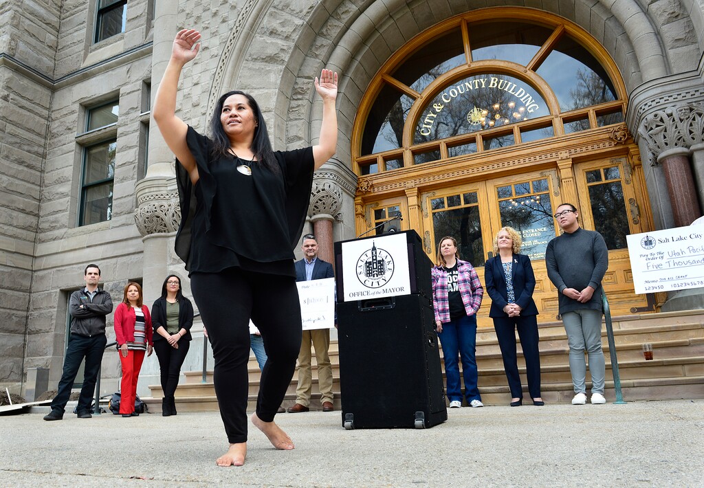 Scott Sommerdorf | The Salt Lake Tribune
Oreta Tupol dances a Tahitian Aparima dance outside City Hall after Mayor Jackie Biskupski gave the Utah Pacific Island Heritage organization a $5,000 ACE grant, Wednesday, April 11, 2018. Salt Lake City is giving $200,000 to 79 organizations in 2018 to promote neighborhood and community arts and cultural events. The ACE grants are given to organizations that promote diversity, inclusion, cultural identity and economic development.