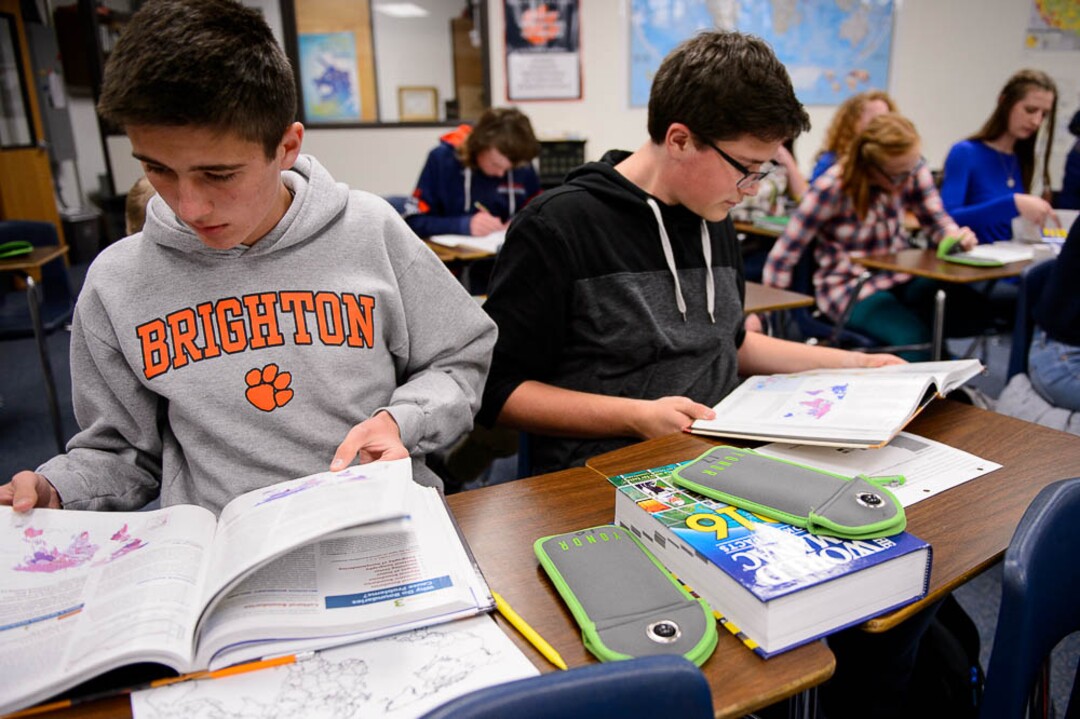 (Trent Nelson | The Salt Lake Tribune) Calvin Bell and Robert Ketchum work in one of Monta Thomas' classes at Brighton High School in Cottonwood Heights near their phones locked up in a pouch made by Yondr.