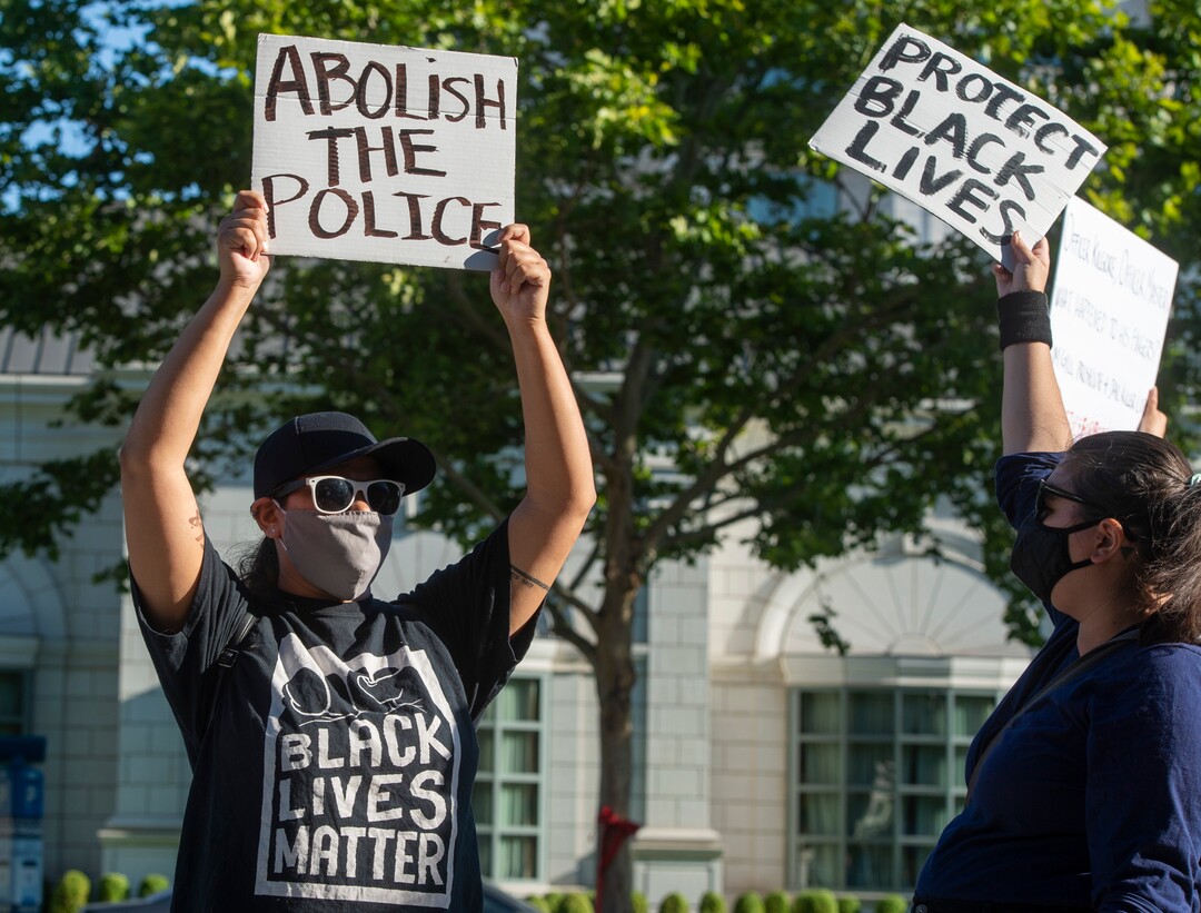 (Rick Egan  |  The Salt Lake Tribune)     Cim and JC join protesters in front of the Salt Lake District Attorney's Office, during a protest to draw attention to Chad Breinholt and Bryan Valencia, who, like Bernardo Palacios were killed by the police, Wednesday, July 8, 2020.