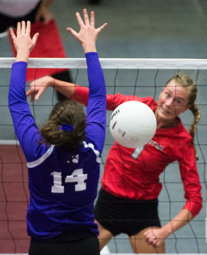 (Rick Egan  |  The Salt Lake Tribune)  past Bountiful Braves Baylee Mittelstaedt (1) hits the ball past Box Elder Bees Annie Mecham (14), in 5A volleyball championship game, Bountiful vs. Box Elder, at Utah Valley University, Saturday, November 4, 2017.