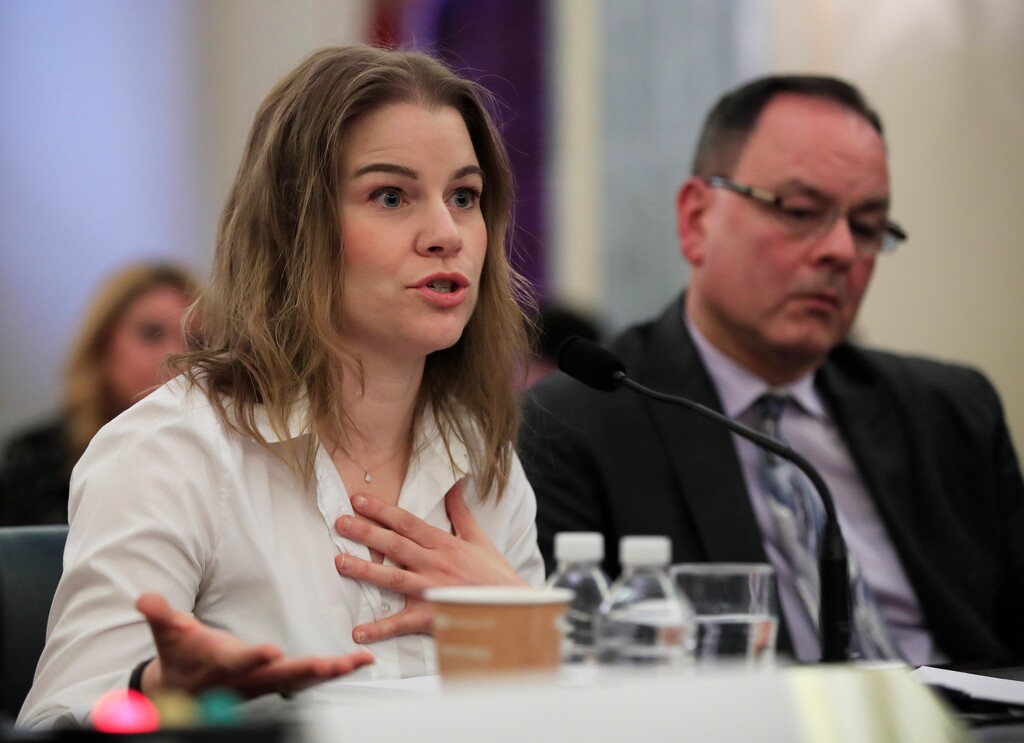 Speed skater Bridie Farrell and figure skater Craig Maurizi, testifies before a Commerce, Science, and Transportation: Subcommittee on Consumer Protection, Product Safety, Insurance, and Data Security hearing about "Olympic abuse: The role of national governing bodies in protecting our athletes" on Capitol Hill in Washington, Wednesday, April 18, 2018. (AP Photo/Manuel Balce Ceneta)