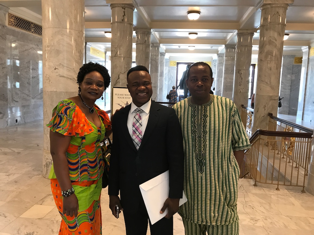 Benjamin Lamah (middle), who came to the U.S. from Guinea eight years ago, was one of 109 Utahns naturalized as U.S. citizens and honored at the Utah State Capitol on Friday.