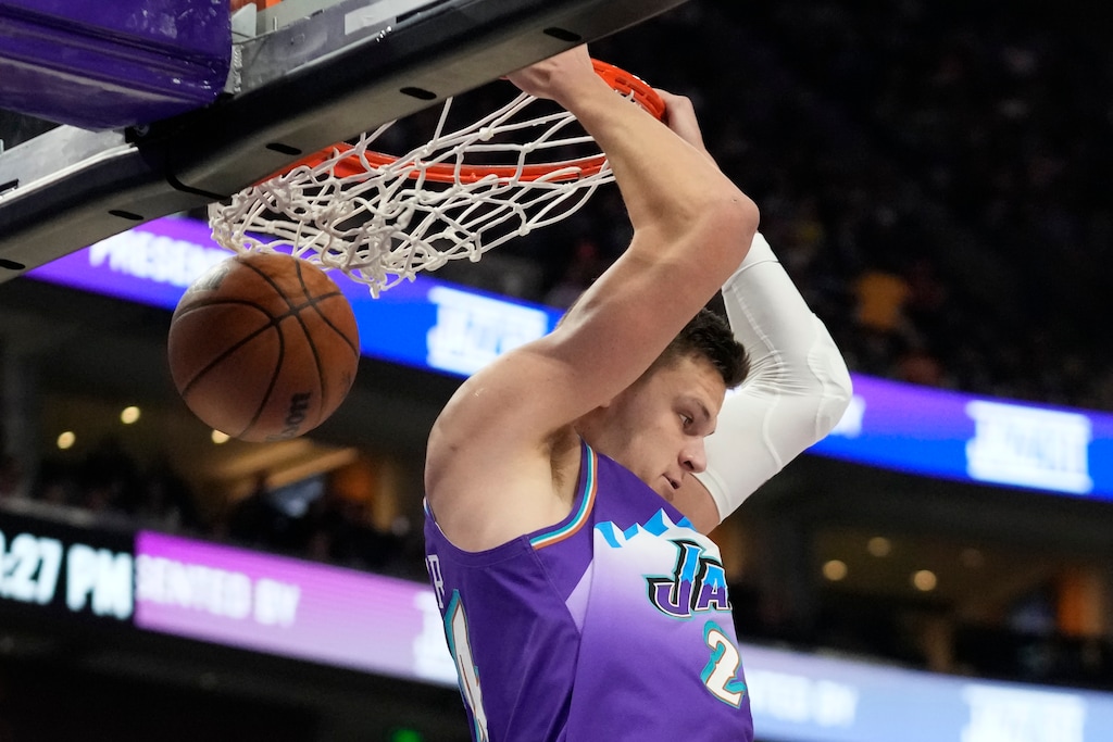 Utah Jazz center Walker Kessler dunks against the Golden State Warriors during the second half of an NBA basketball game Wednesday, Dec. 7, 2022, in Salt Lake City. (AP Photo/Rick Bowmer)
