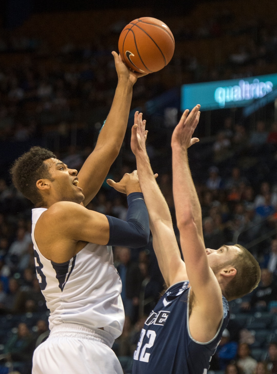 (Rick Egan  |  The Salt Lake Tribune)   Brigham Young Cougars forward Yoeli Childs (23) shoots over Rice Owls forward Jack Williams (32), in basketball action between Brigham Young Cougars and Rice Owls, at the Marriott Center in Provo, Wednesday, Nov. 21, 2018.