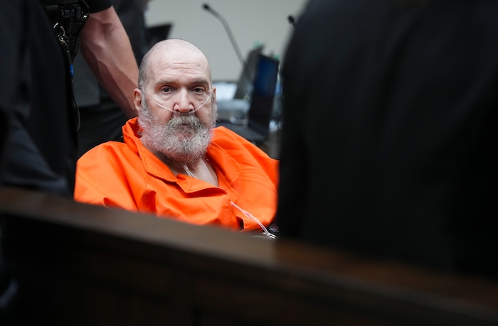 (Bethany Baker  |  The Salt Lake Tribune) Ralph Menzies appears during his commutation hearing before the parole board as he petitions to stop his execution by firing squad, seen here at the Utah State Correctional Facility in Salt Lake City on Wednesday, Aug. 13, 2025. Menzies died Nov. 26, 2025, of natural causes in a Salt Lake City-area hospital, at age 67.