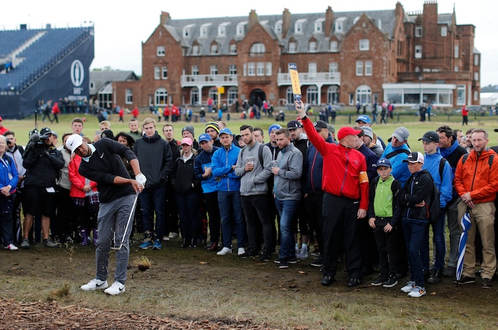 Tony Finau of the US hits out of the rough to the 1st green during the final round of the British Open Golf Championship at the Royal Troon Golf Club in Troon, Scotland, Sunday, July 17, 2016. (AP Photo/Ben Curtis)