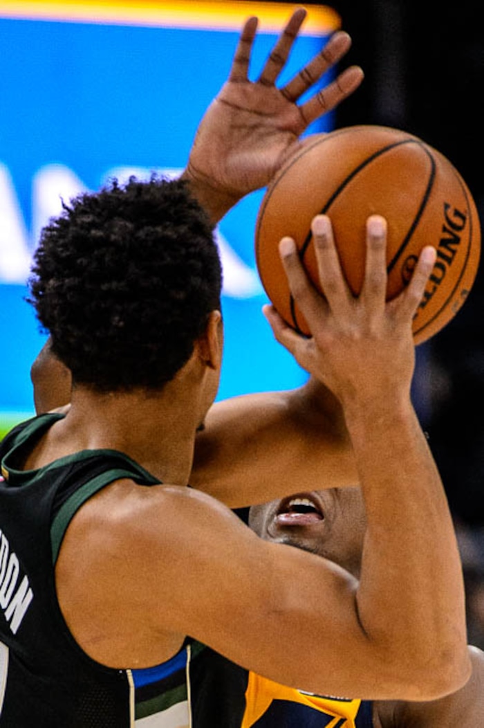 (Trent Nelson | The Salt Lake Tribune)  Utah Jazz guard Donovan Mitchell (45) defends Milwaukee Bucks guard Malcolm Brogdon (13) as the Utah Jazz host the Milwaukee Bucks, NBA basketball in Salt Lake City Saturday November 25, 2017.