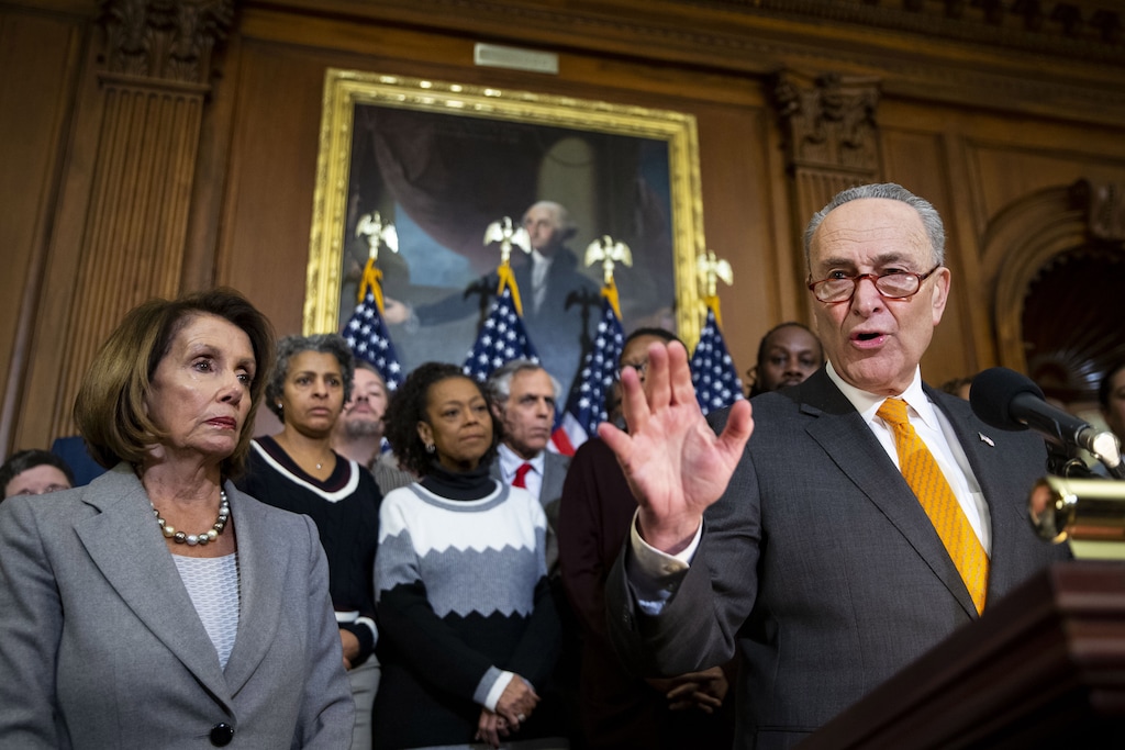 (Al Drago | Bloomberg) Senate Minority Leader Chuck Schumer, D-N.Y., speaks while House Speaker Nancy Pelosi, D-Calif., at the U.S. Capitol in Washington on Jan. 9, 2019.