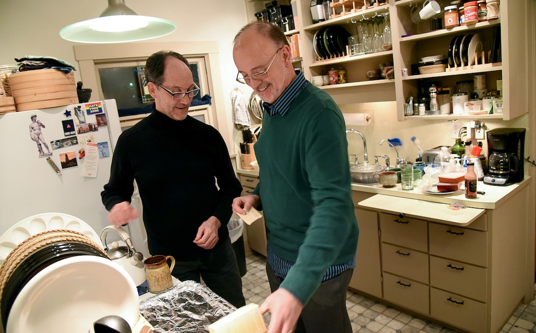 (Francisco Kjolseth  |  The Salt Lake Tribune)  Brian Benington, left, and Duane Jennings, who have been together since 2005, gather in the kitchen of their home in Salt Lake City recently. The two married in Salt Lake County on Dec. 23, 2013, following the Kitchen v. Herbert decision that came down a few days prior on Dec. 20. 