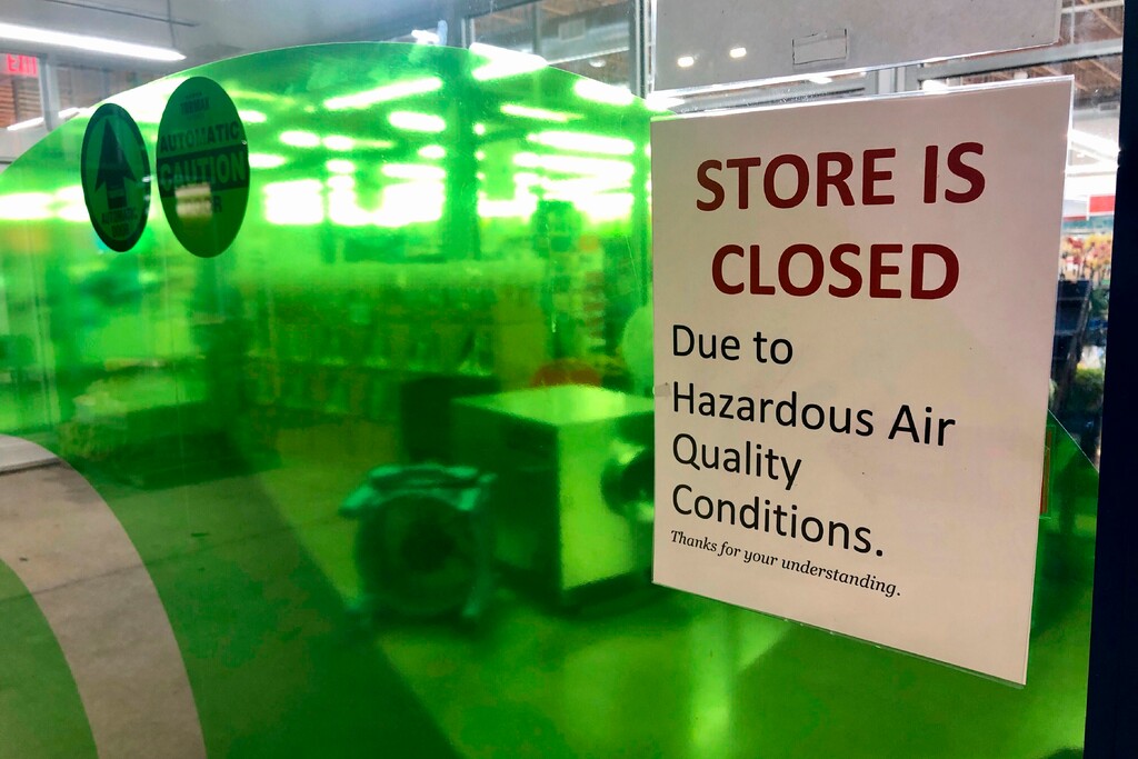 (Gillian Flaccus | AP photo)

A sign at a Whole Foods in Lake Oswego, Ore., advises that the store is closed Monday due to poor air quality. Another sign said all Whole Foods stores in the Portland Metro area will be closed at least through Thursday due to air quality. People across the West struggled under acrid-yellowish green smog from raging wildfires that seeped into homes and businesses, sneaked into cars through air conditioning vents and caused the temporary closure of iconic locations such as Powell's Books and the Oregon Zoo. And forecasters say the putrid air, measured as the worst on the planet, could last well into the week.