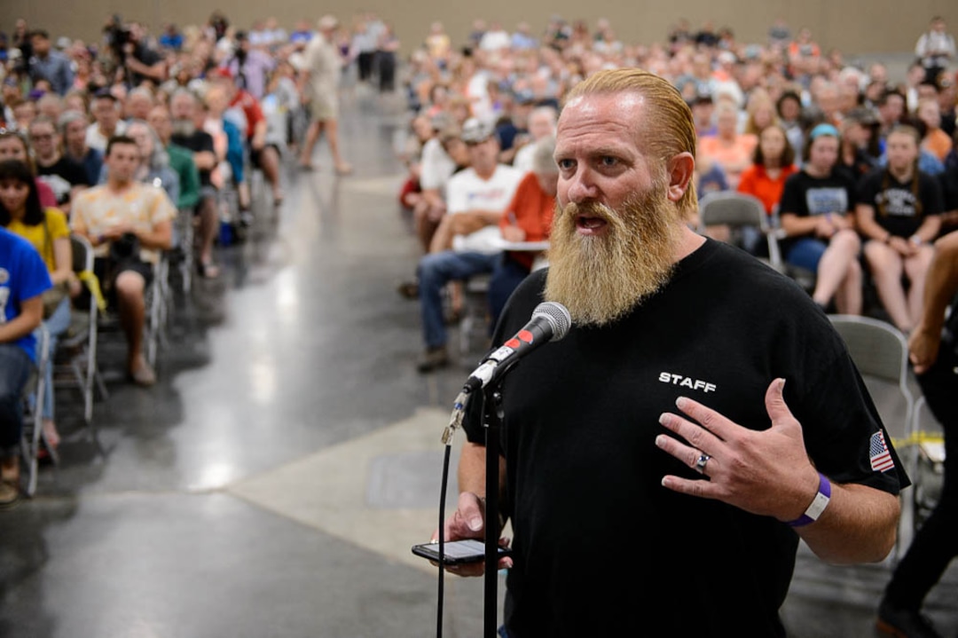 (Trent Nelson | The Salt Lake Tribune)  Sam Robinson of Utah Gun Exchange asks a question of student activists involved with the March for Our Lives movement at a town hall at the Mountain America Expo Center in Sandy, Saturday July 14, 2018.