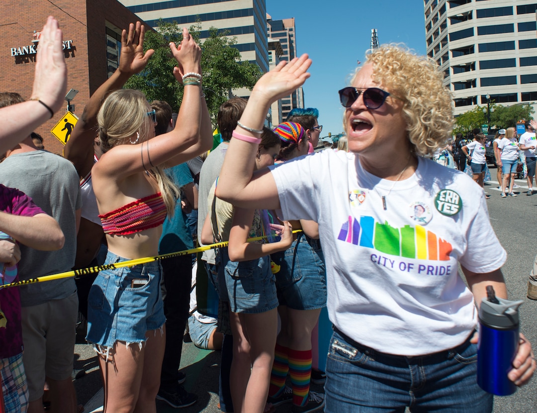 (Rick Egan  |  The Salt Lake Tribune)   Salt Lake City Mayor, Jackie Biskupski high-fives parade goers as she walks in the Utah Pride Parade, Sunday, June 3, 2018.