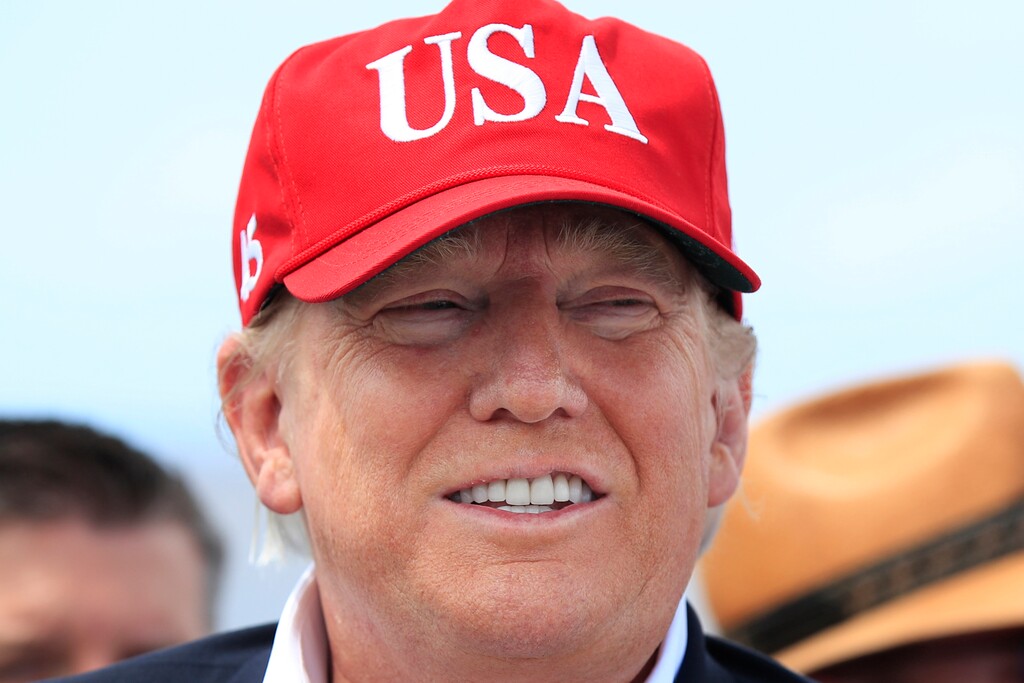 FILE - In this March 29, 2019 file photo, President Donald Trump speaks to reporters during a visit to Lake Okeechobee and Herbert Hoover Dike at Canal Point, Fla. A Texas company is launching a new political donation app for Republicans that will rival a similar platform endorsed by President Donald Trump, potentially complicating GOP efforts to match Democrats’ online fundraising success. (AP Photo/Manuel Balce Ceneta)