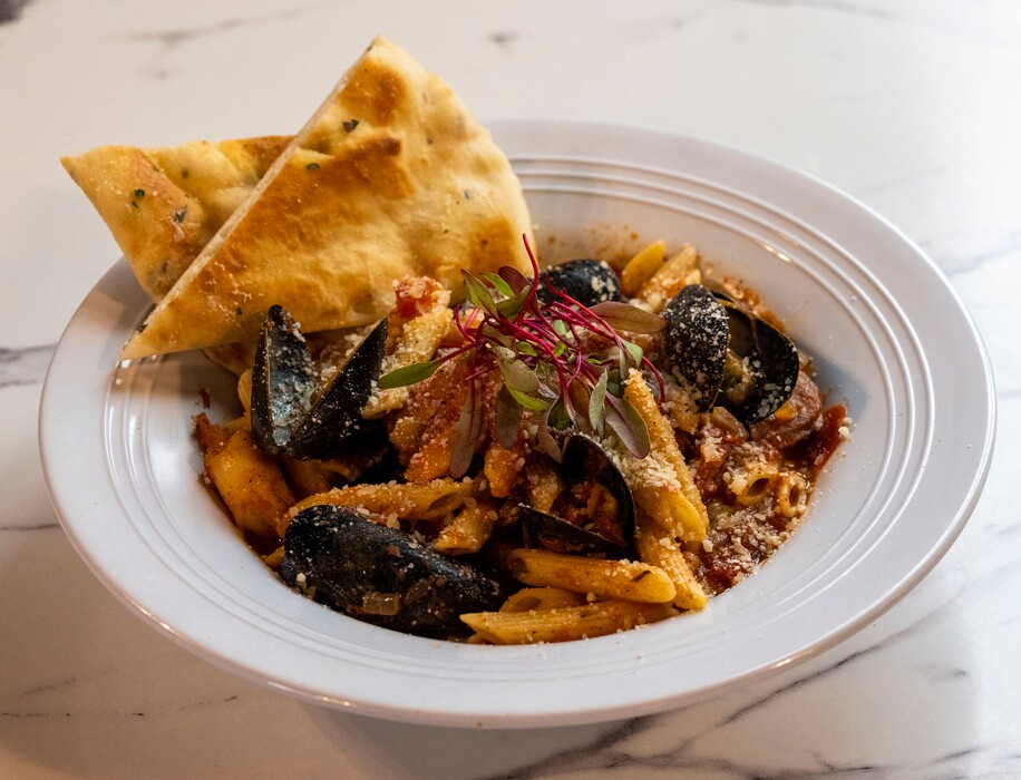 (Rick Egan | The Salt Lake Tribune)  Mussel arrabbiata, with shrimp and andouille sausage, at Neutral Ground Lounge in Salt Lake City, Tuesday, Aug. 30, 2022.