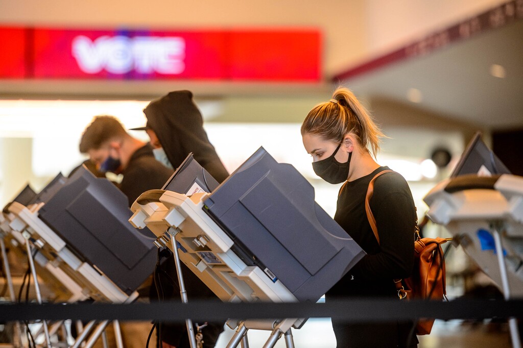 (Trent Nelson  |  The Salt Lake Tribune) Voters at Vivint Smart Home Arena in Salt Lake City on election day, Tuesday, Nov. 3, 2020.