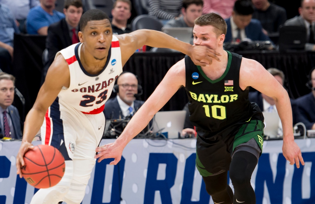 (Leah Hogsten  | The Salt Lake Tribune)  Gonzaga Bulldogs guard Zach Norvell Jr. (23) catches Baylor Bears guard Makai Mason (10) in the face as Baylor faces Gonzaga in the second round of the NCAA tournament in Salt Lake City on Saturday, March 23, 2019.