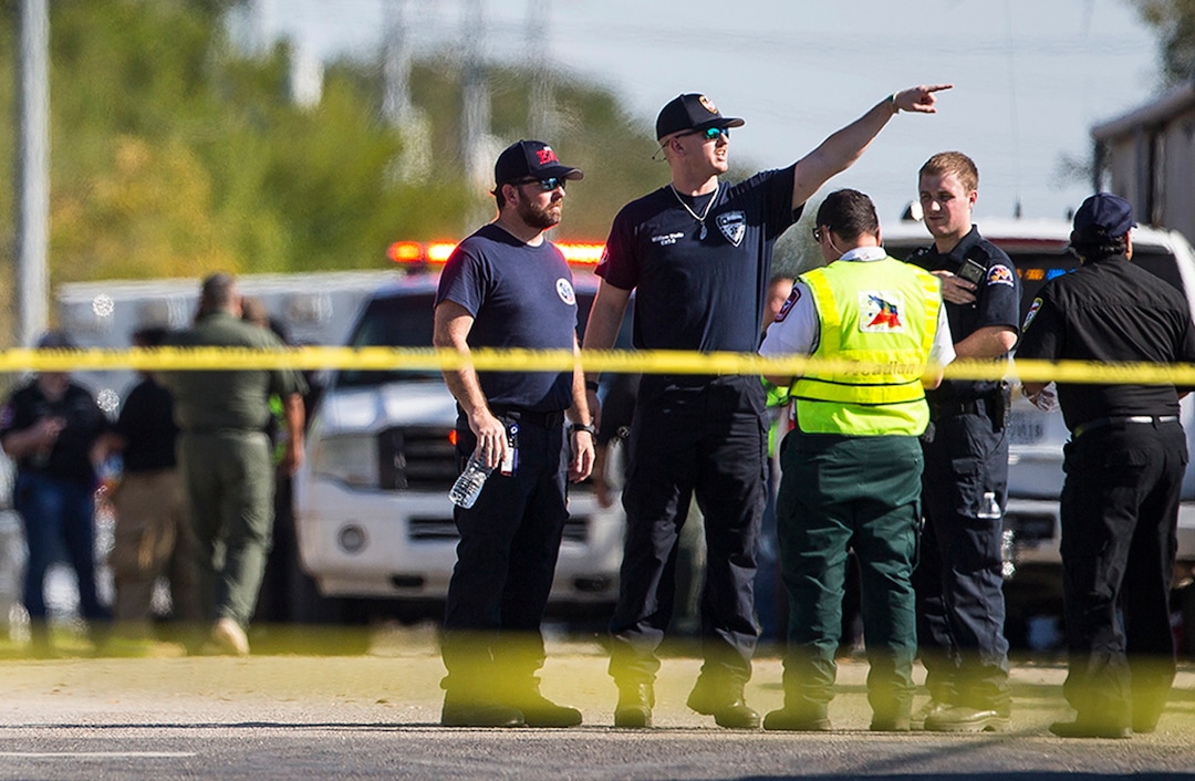 (Nick Wagner | Austin American-Statesman via AP) Law enforcement officials work the scene of a fatal shooting at the First Baptist Church in Sutherland Springs, Texas, on Sunday, Nov. 5, 2017.